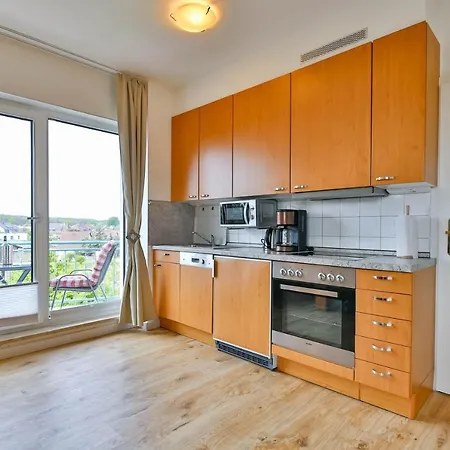 Tine Mit Balkon, Fahrraedern Und Strandkorb Im Sommer