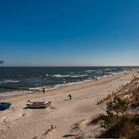 Tine Mit Balkon, Fahrraedern Und Strandkorb Im Sommer