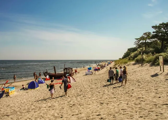 Tine Mit Balkon, Fahrraedern Und Strandkorb Im Sommer
